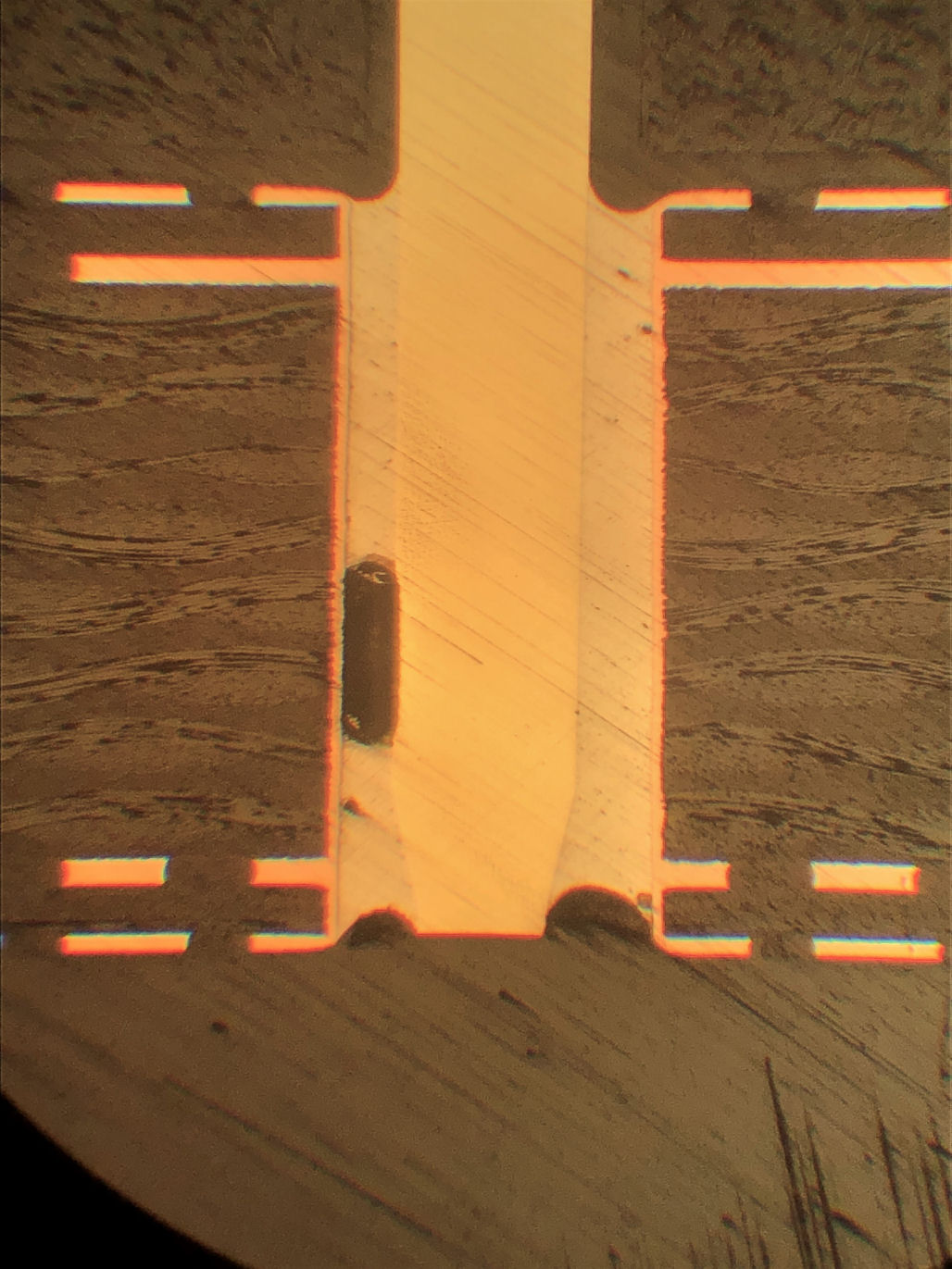 Residues left on a silicon wafer after wet chemical etching viewed at X 10,000 magnification